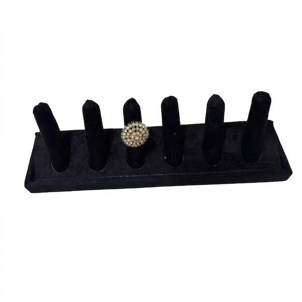 velvet 6-slot ring display stand for jewelry store display with decorative pearl ring showcased on soft velvet holder.
