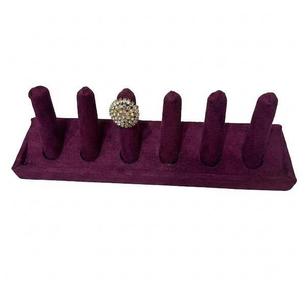 velvet 6-slot ring display stand for jewelry store display with decorative pearl ring showcased on soft velvet holder.